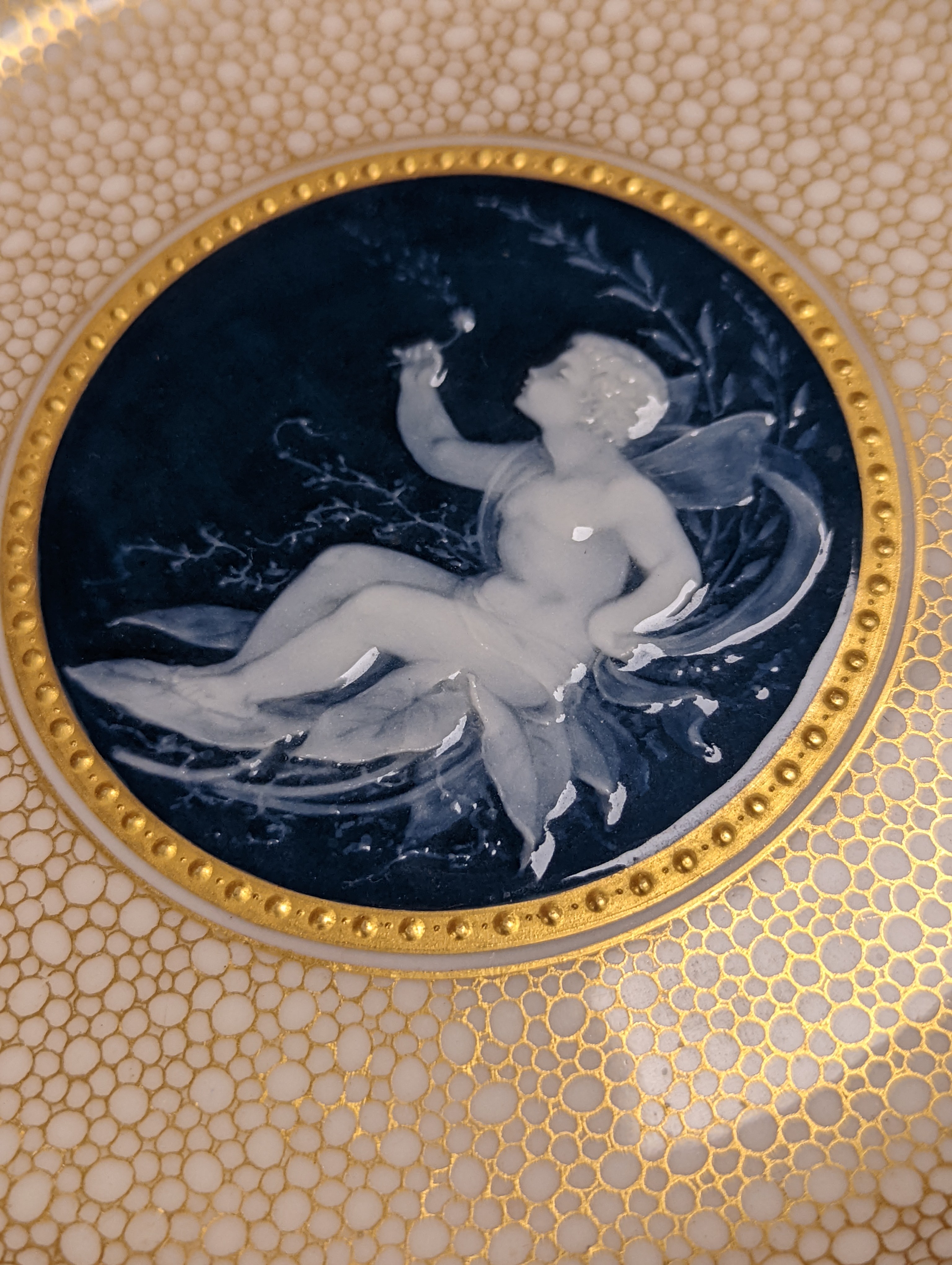 A Mintons pate sur pate cabinet plate, attributed to Alboin Birks, c.1905, diameter 23cm